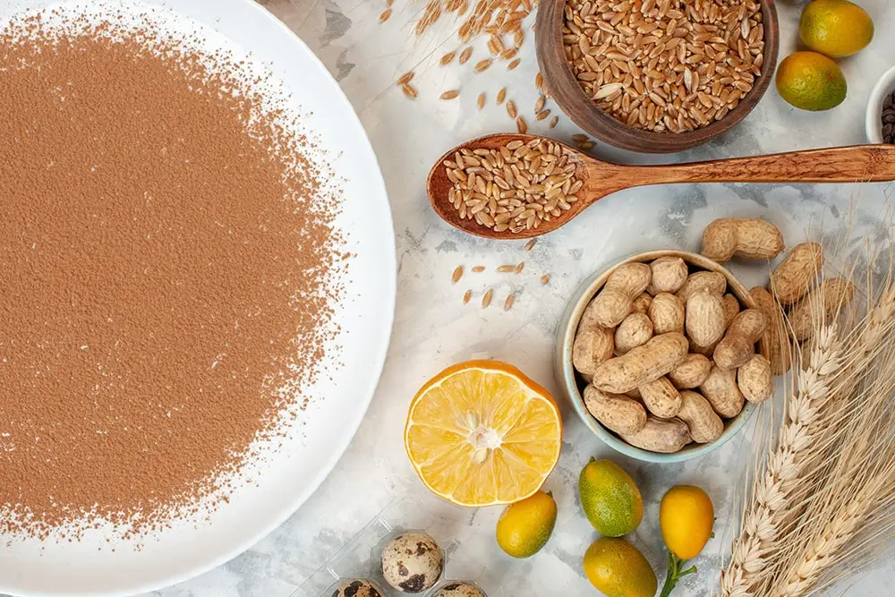 Wheat, nuts, and other allergens on a table representing the importance of buffet labels.