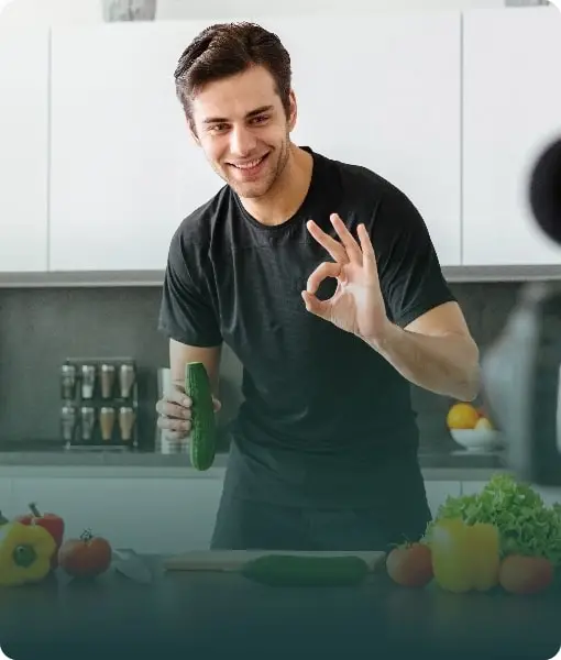 A smiling male giving the 